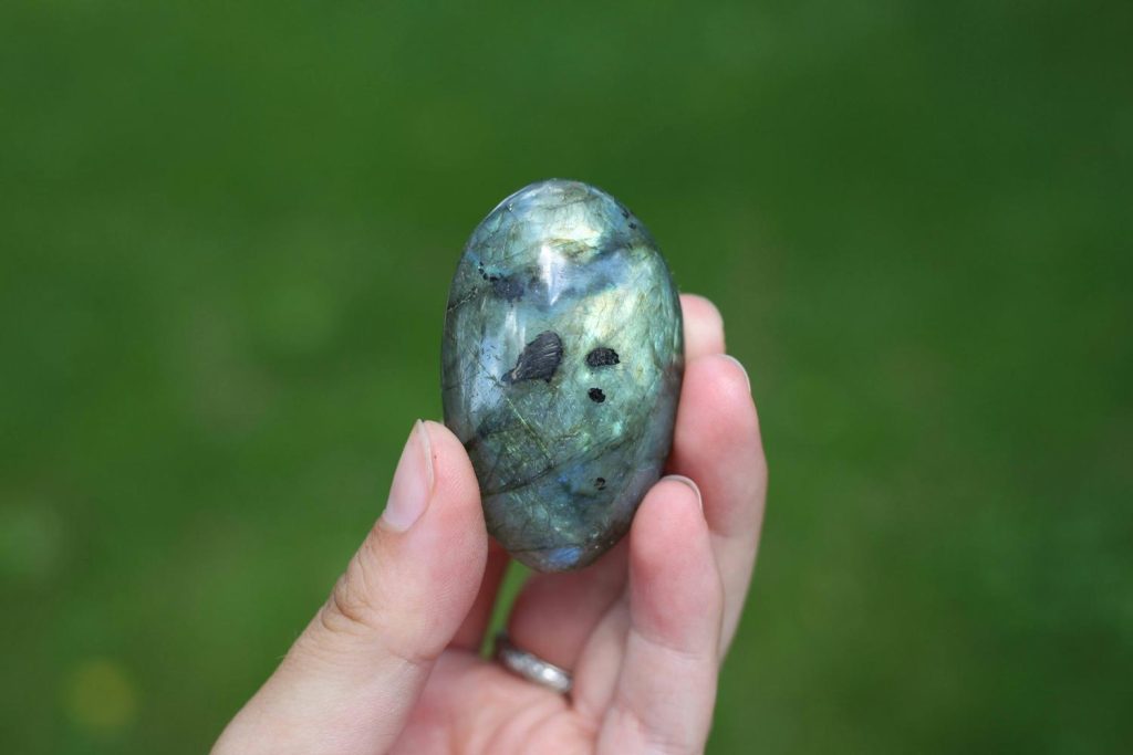 Polished labradorite palm stone – starseed spiritual products for meditation
